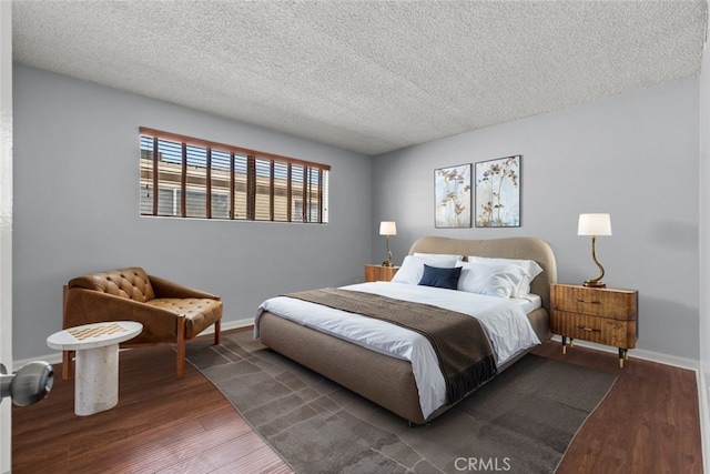 20234 Cohasset St Unit 11, Winnetka, CA 91306 - bedroom with wood finished floors, a textured ceiling, and baseboards