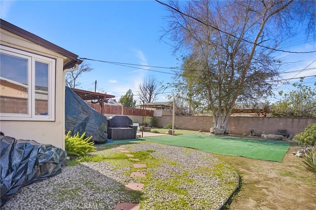 view of yard with a fenced backyard and a patio