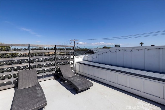 view of patio / terrace featuring a balcony