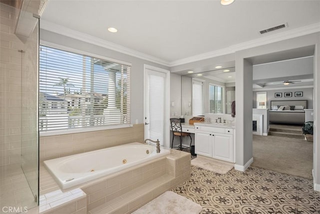 ensuite bathroom with a whirlpool tub, tile patterned floors, visible vents, and ornamental molding