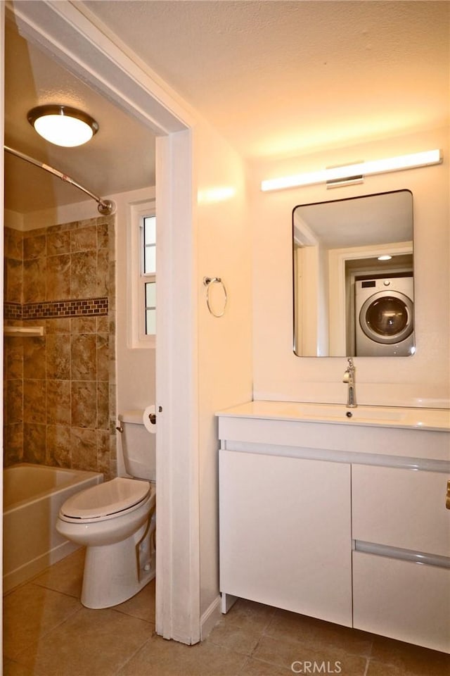 full bathroom with toilet, vanity, washtub / shower combination, and tile patterned floors