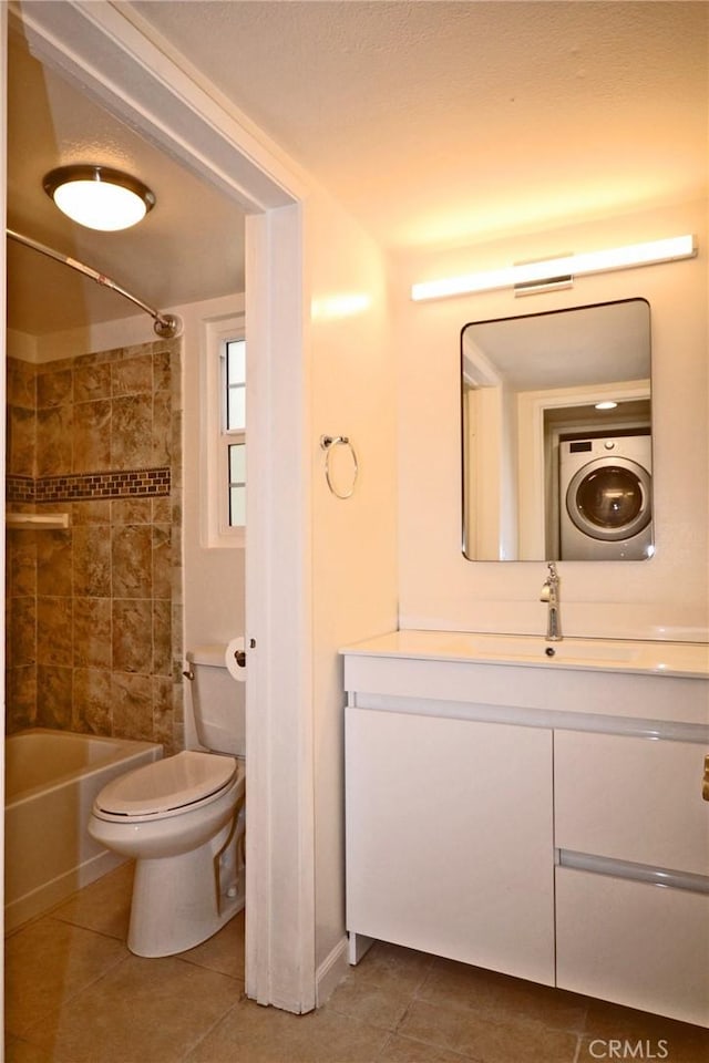 full bath with toilet, tile patterned floors, bathtub / shower combination, and vanity