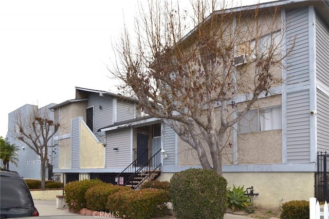 view of front of property with entry steps