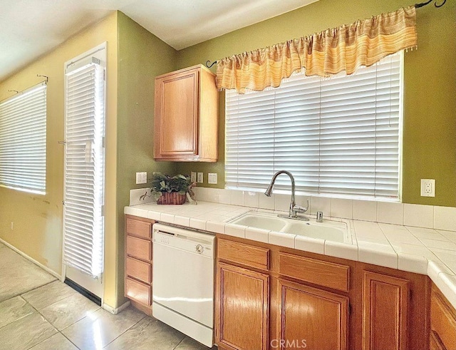 kitchen with a sink and dishwasher