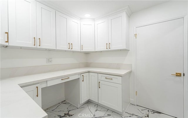 interior space with marble finish floor and recessed lighting