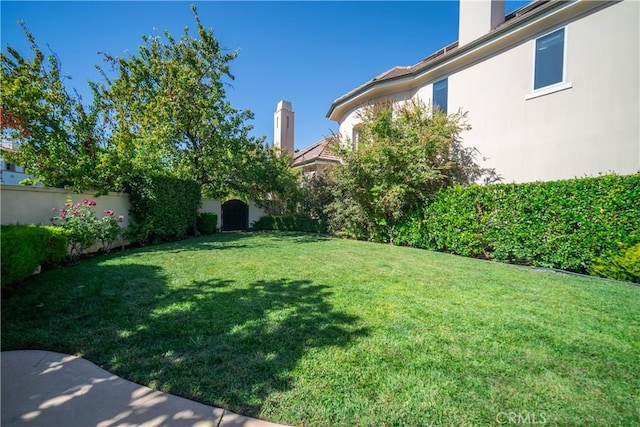 view of yard featuring a fenced backyard