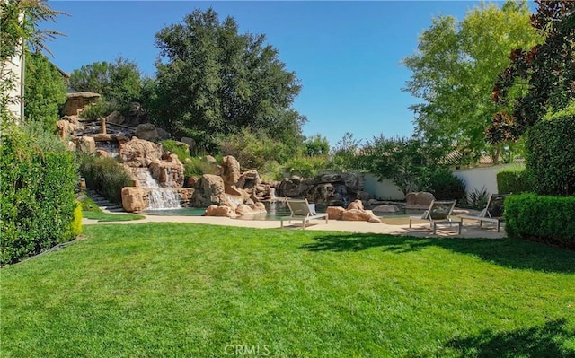 view of yard featuring a patio area and fence