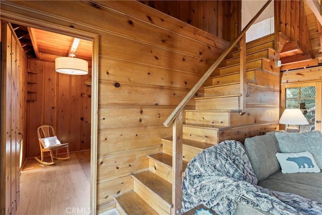 612 Rose Ln, Twin Peaks, CA 92391 - staircase featuring wooden walls and wood finished floors