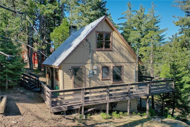 612 Rose Ln, Twin Peaks, CA 92391 - back of house with a deck and a chimney
