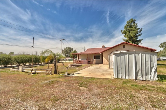 25602 Malaga Rd, Menifee, CA 92585 - back of property featuring stucco siding and a tile roof