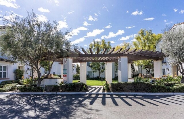 view of front of home with a pergola