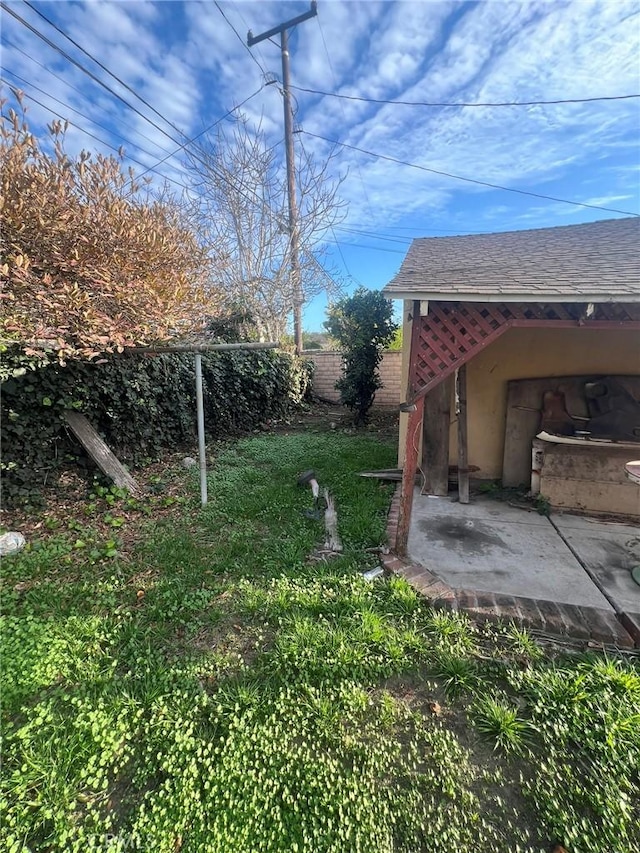 view of yard with a patio area and fence