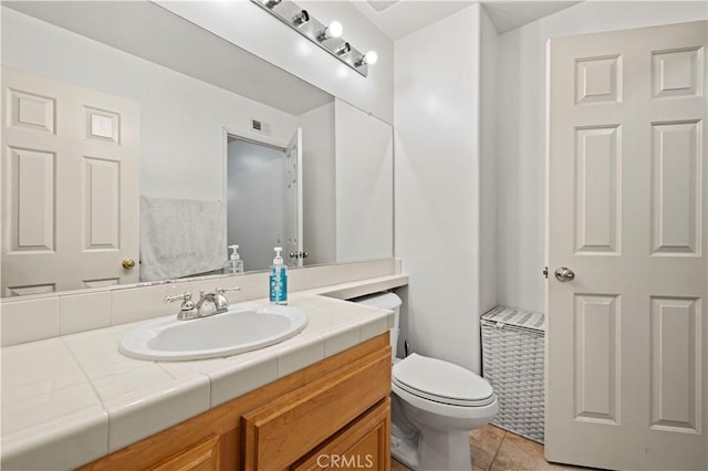 14218 Yellowstone Ln, Canyon Country, CA 91387 - bathroom featuring vanity, toilet, and tile patterned floors
