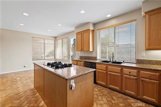 14218 Yellowstone Ln, Canyon Country, CA 91387 - kitchen with a sink, dishwasher, gas cooktop, a kitchen island, and brick floors
