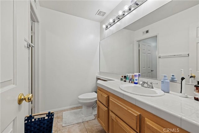 14218 Yellowstone Ln, Canyon Country, CA 91387 - bathroom featuring vanity, toilet, tile patterned floors, and baseboards