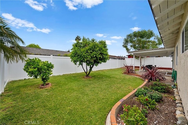 view of yard with a fenced backyard