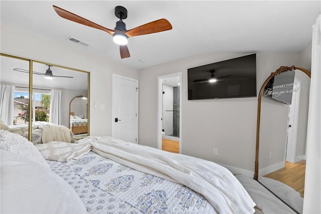 bedroom with a ceiling fan, baseboards, visible vents, and light wood-type flooring