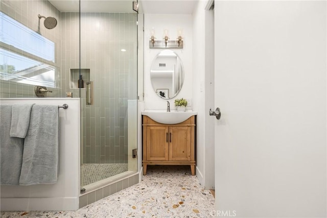 6239 E 6th St, Long Beach, CA 90803 - bathroom with a shower stall, vanity, and baseboards