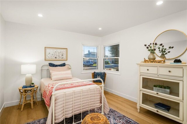 6239 E 6th St, Long Beach, CA 90803 - bedroom with baseboards, light wood-style floors, and recessed lighting