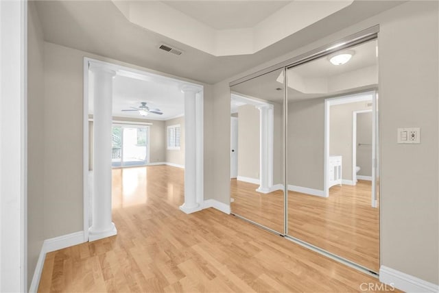 22517 Lazy Meadow Dr, Diamond Bar, CA 91765 - hallway with decorative columns, light wood-type flooring, and baseboards