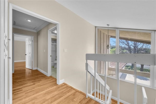 22517 Lazy Meadow Dr, Diamond Bar, CA 91765 - corridor with an upstairs landing, baseboards, crown molding, and light wood-style floors