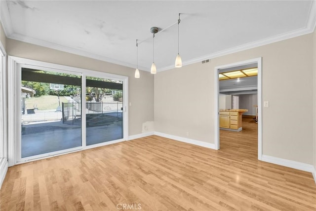 22517 Lazy Meadow Dr, Diamond Bar, CA 91765 - empty room featuring crown molding, baseboards, and light wood-style flooring