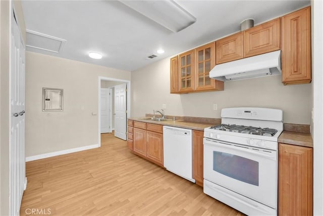 22517 Lazy Meadow Dr, Diamond Bar, CA 91765 - kitchen with white appliances, under cabinet range hood, a sink, light wood-style flooring, and glass insert cabinets