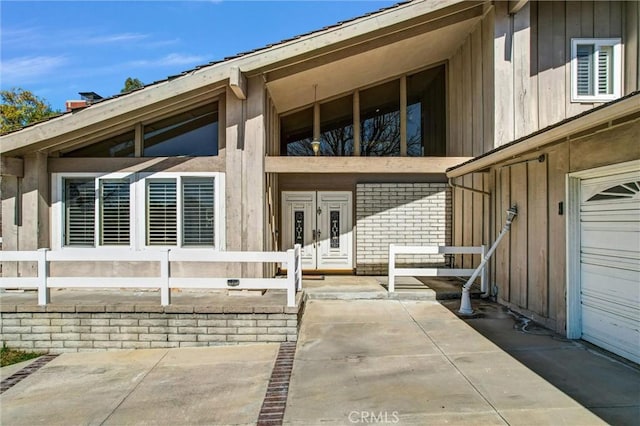 exterior space featuring brick siding