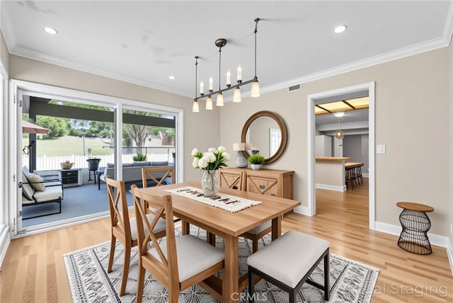 22517 Lazy Meadow Dr, Diamond Bar, CA 91765 - dining area featuring crown molding, light wood-style floors, recessed lighting, baseboards, and a chandelier