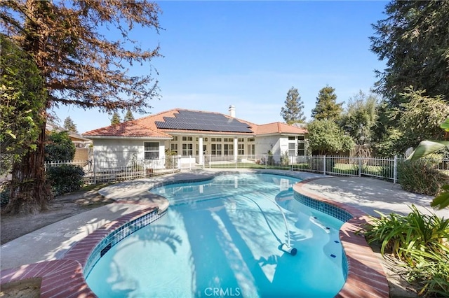 view of swimming pool featuring a fenced backyard, a fenced in pool, and a patio