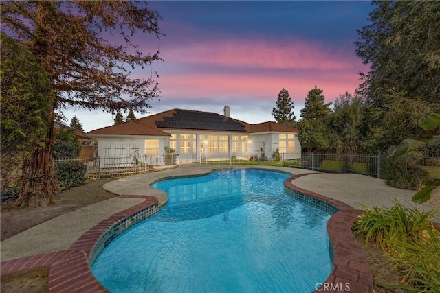 view of swimming pool with a fenced in pool, a patio area, and a fenced backyard