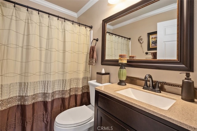 bathroom featuring toilet, crown molding, and vanity