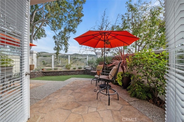 view of patio / terrace with fence