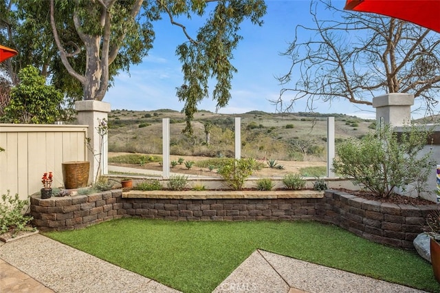 view of yard with fence