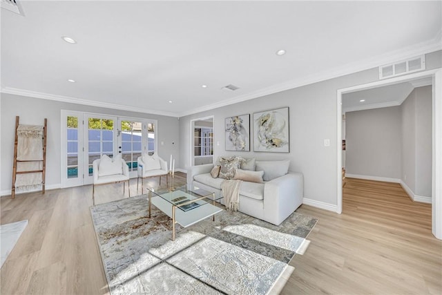3024 Via Rivera, Palos Verdes Estates, CA 90274 - living room with french doors, wood finished floors, ornamental molding, and recessed lighting