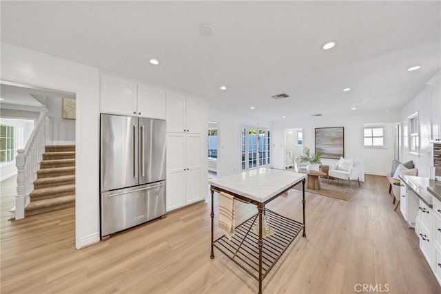 3024 Via Rivera, Palos Verdes Estates, CA 90274 - kitchen with high end fridge, light wood-type flooring, white cabinetry, and recessed lighting