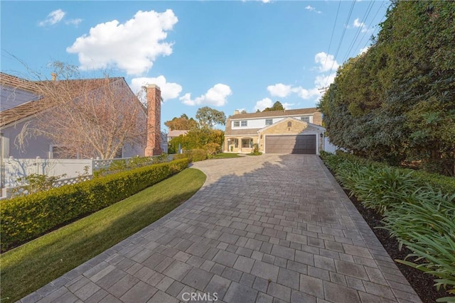 3024 Via Rivera, Palos Verdes Estates, CA 90274 - view of front of house with decorative driveway and a chimney