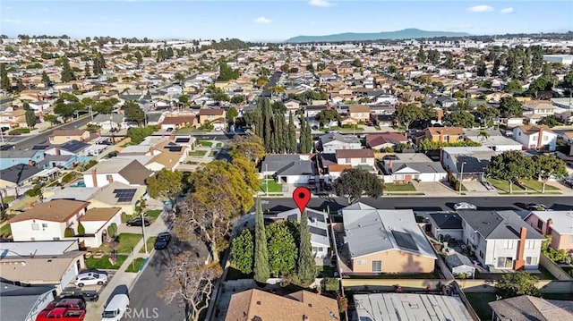 birds eye view of property with a residential view