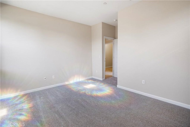4907 Durant Way, Merced, CA 95348 - empty room with baseboards and carpet flooring
