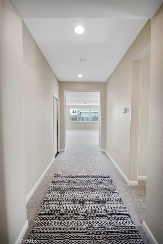 4907 Durant Way, Merced, CA 95348 - corridor featuring baseboards, recessed lighting, and carpet