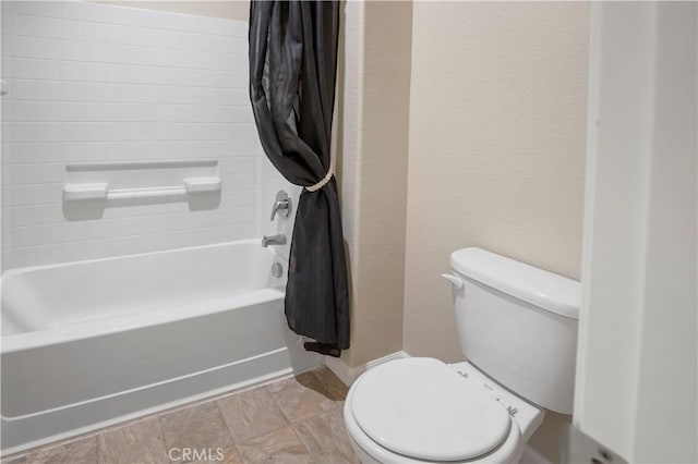 4907 Durant Way, Merced, CA 95348 - full bathroom with baseboards, shower / bath combo with shower curtain, and toilet