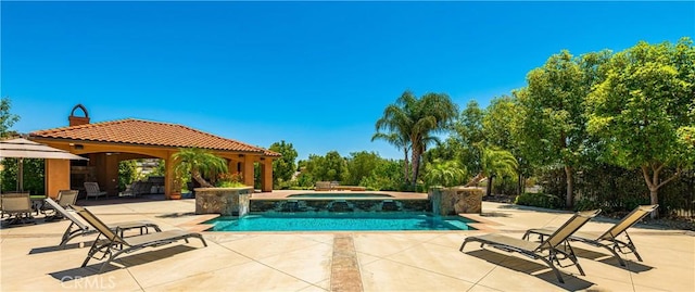 view of swimming pool featuring a gazebo, a patio area, and a pool with connected hot tub