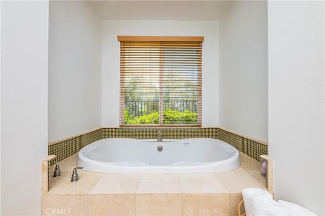 bathroom featuring a garden tub