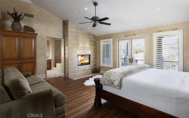 3824 Vista Blanca, San Clemente, CA 92672 - bedroom featuring access to outside, dark wood finished floors, a multi sided fireplace, french doors, and recessed lighting