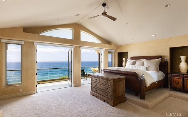 3824 Vista Blanca, San Clemente, CA 92672 - bedroom featuring access to exterior, vaulted ceiling, a water view, multiple windows, and light colored carpet