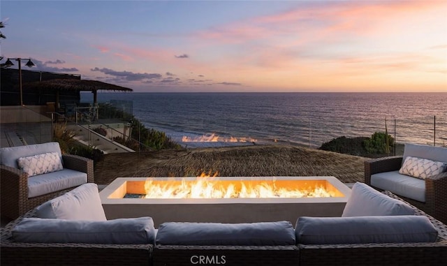 3824 Vista Blanca, San Clemente, CA 92672 - patio terrace at dusk with a water view and an outdoor living space with a fire pit