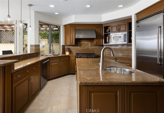 3824 Vista Blanca, San Clemente, CA 92672 - kitchen with a sink, built in appliances, wall chimney range hood, backsplash, and recessed lighting