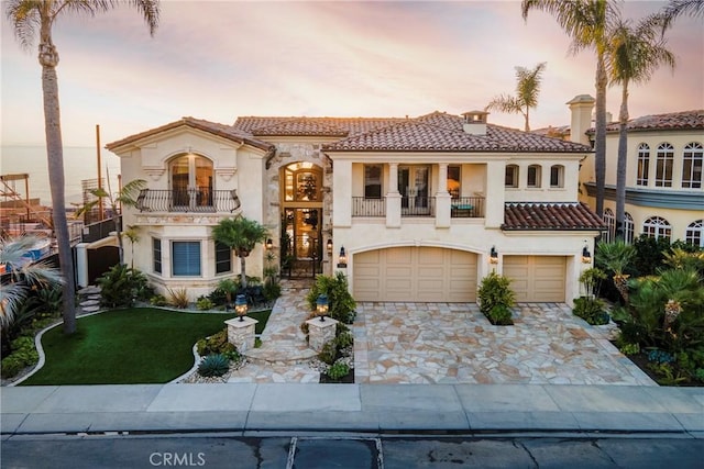 3824 Vista Blanca, San Clemente, CA 92672 - mediterranean / spanish house with a balcony, french doors, a tile roof, and stucco siding