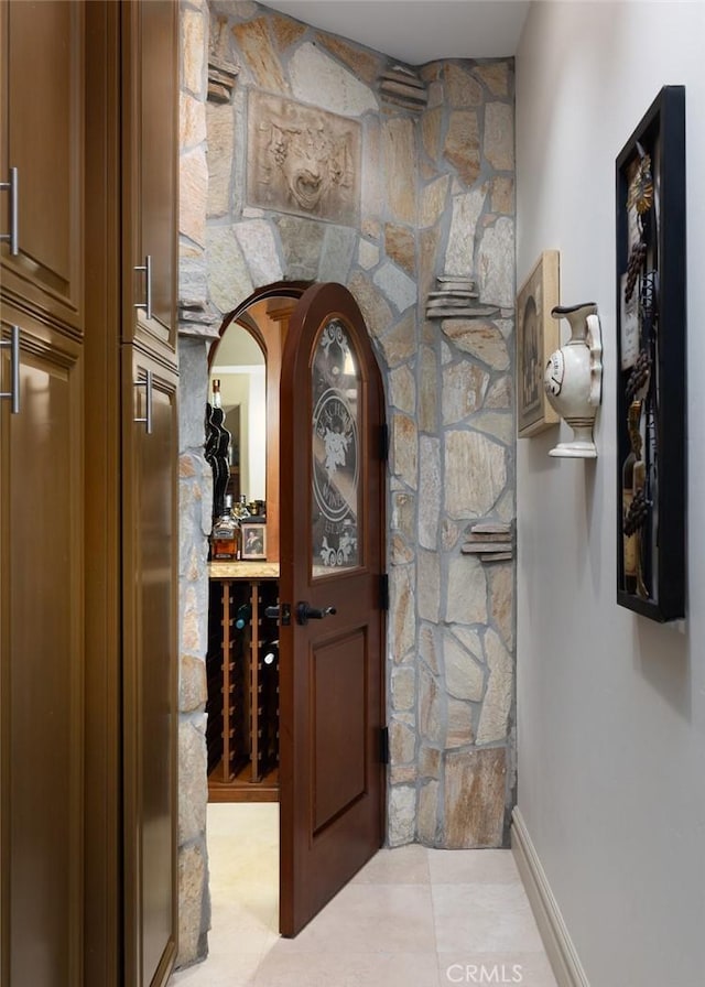 3824 Vista Blanca, San Clemente, CA 92672 - wine room featuring light tile patterned floors and arched walkways