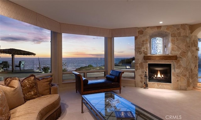 3824 Vista Blanca, San Clemente, CA 92672 - carpeted living room featuring a water view and a fireplace